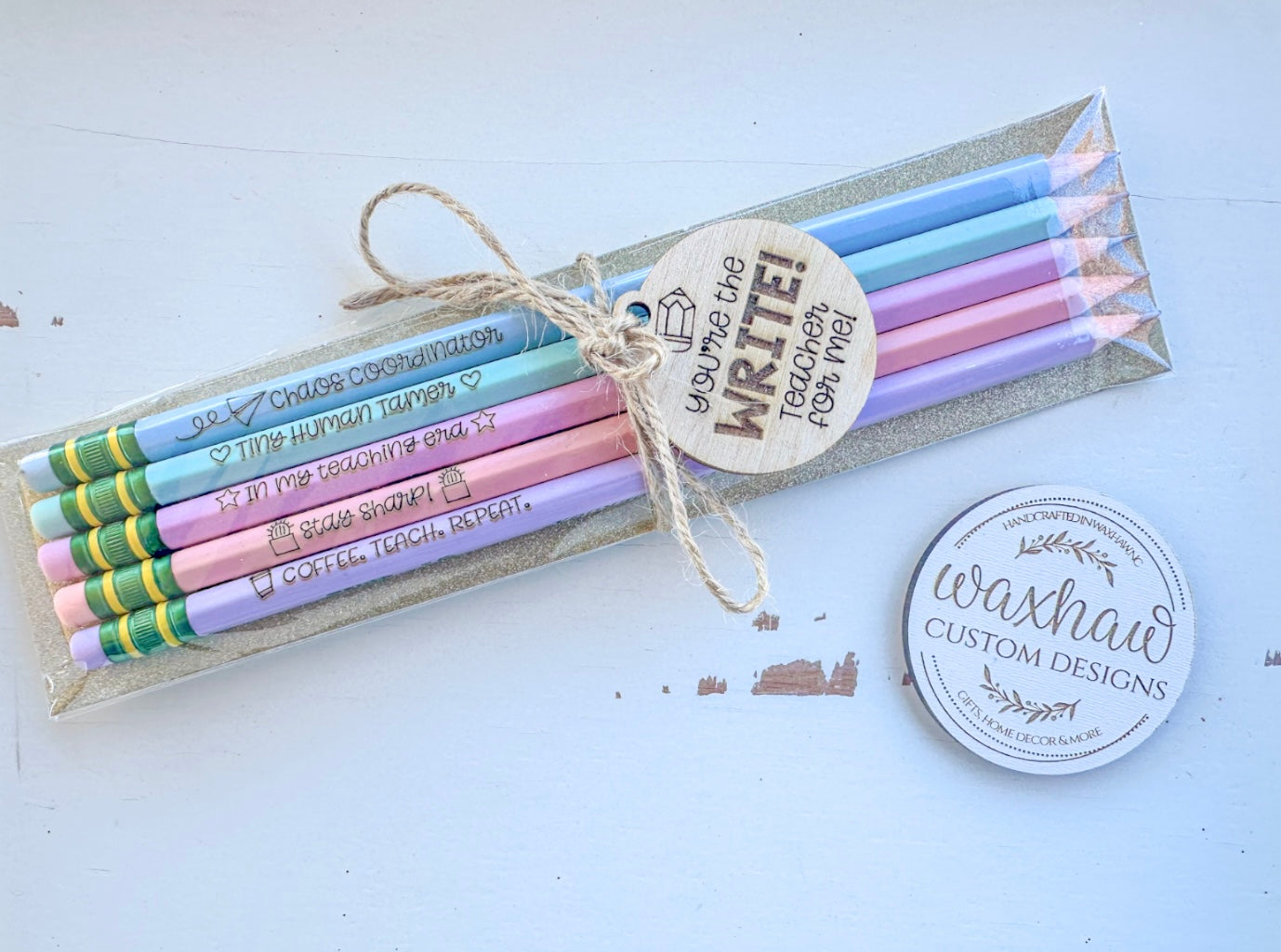 5 pencils giftwrapped with wood tag